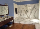 master bathroom with walk in open marble shower
